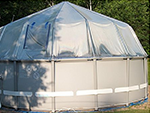 Side view of a new Sundome on a soft-sided pool